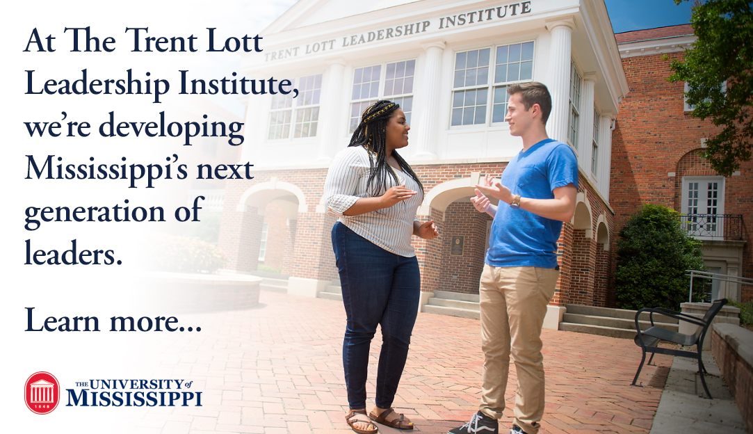 Students conversing outside the Lott Institute building with text - At The Trent Lott Institute, we're developing Mississippi's next generation of leaders. Learn more...
